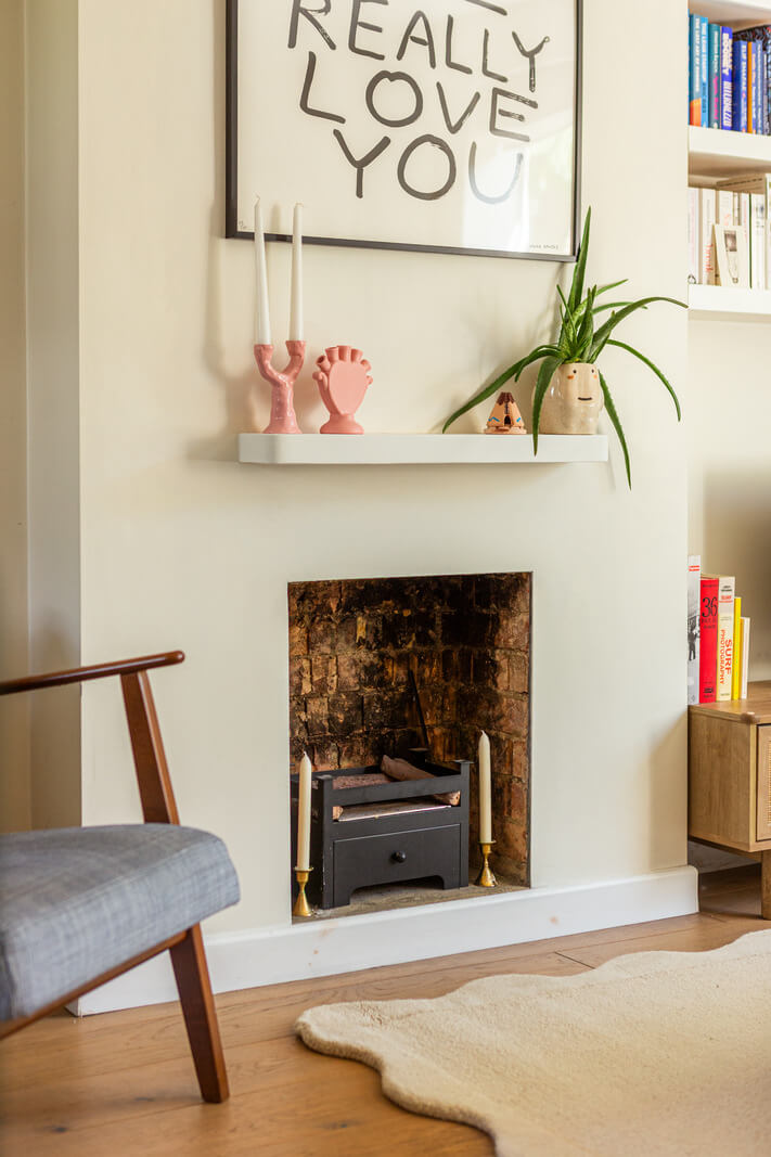 An Open-Plan Living Space and Colorful Bedrooms in a London Duplex 4 fireplace detail