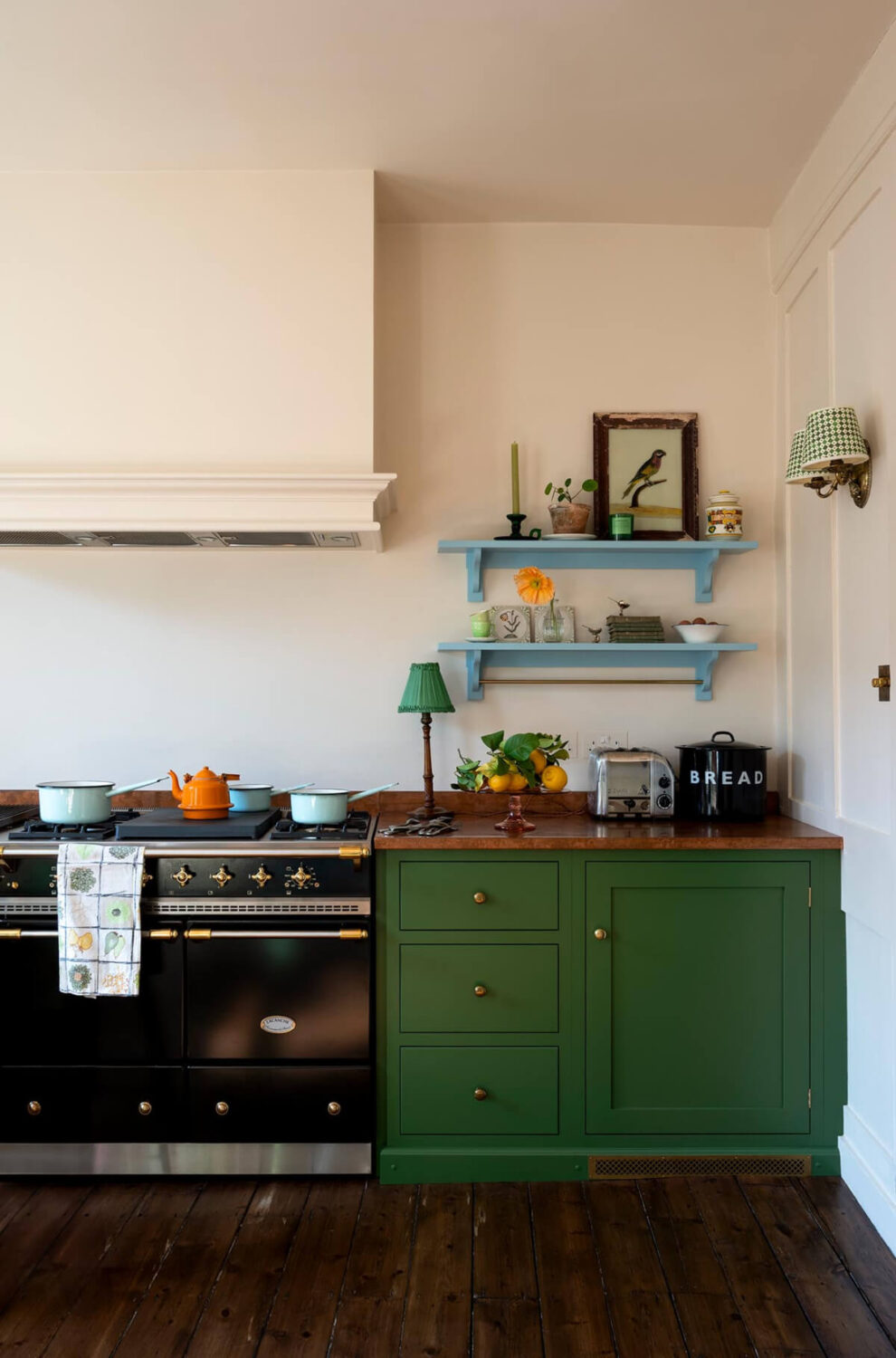 A Small, Green deVOL Kitchen in a 17th-Century London Mews House 8 green devol shaker cabinets with baby blue wooden shelves nordroom