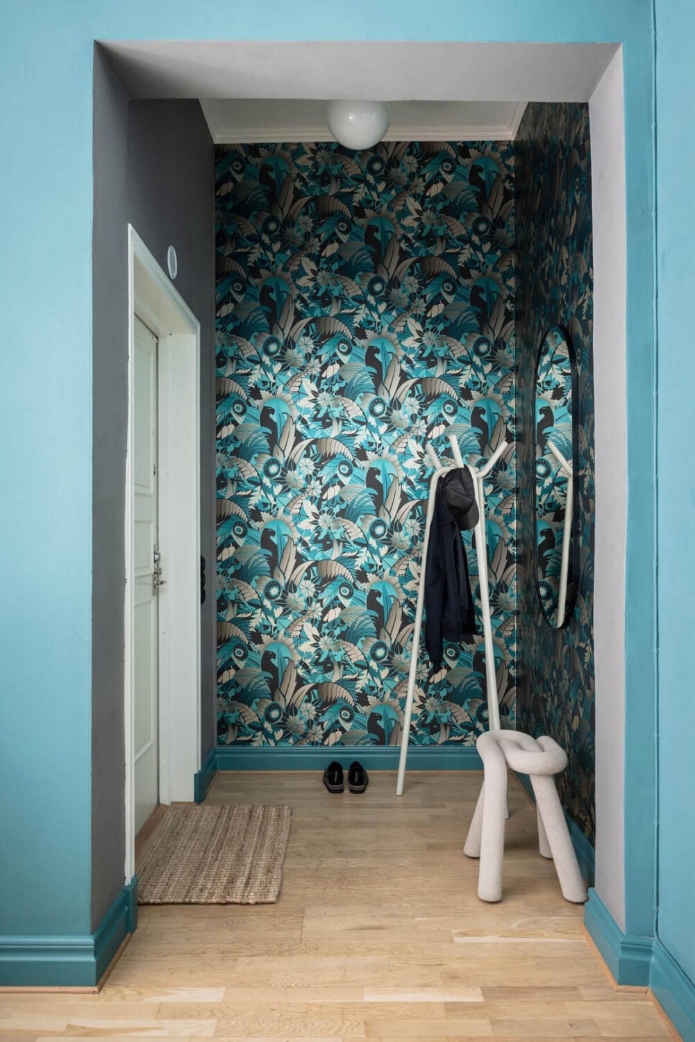 A Teal Green Living Room and Large Windows in a Swedish Apartment 27 hall osborne and little wallpaper