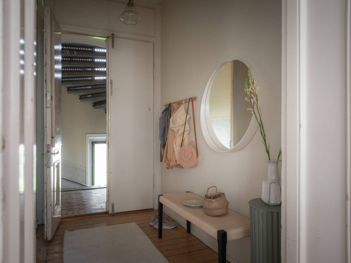 A Historic Apartment with Classic Wallpapers and Contemporary Furniture 19 hall round mirror A Historic Apartment with Classic Wallpapers and Contemporary Furniture