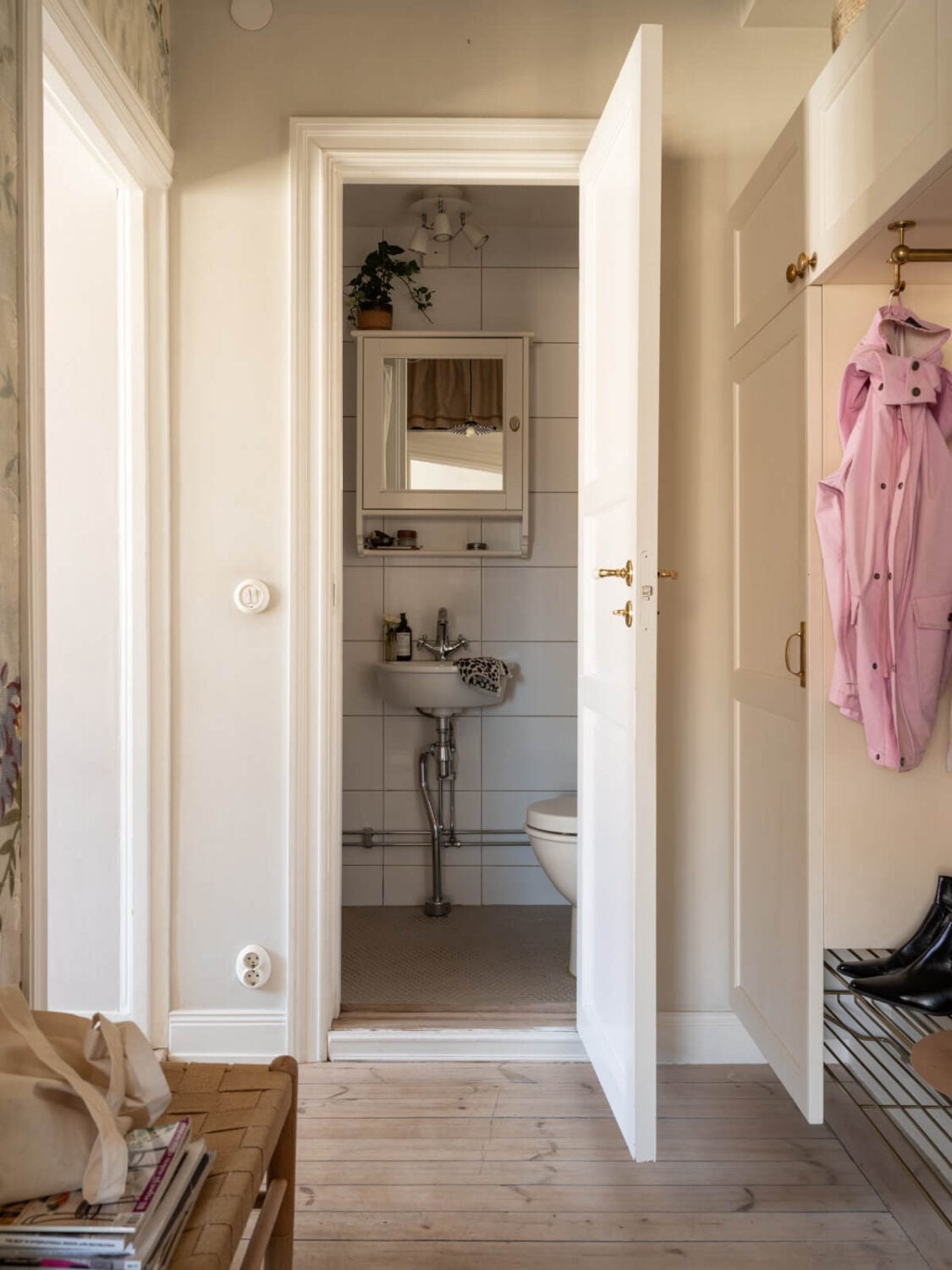 A Small Light-Filled Corner Apartment with Original Details 20 hall view into bathroom A Small Light-Filled Corner Apartment with Original Details