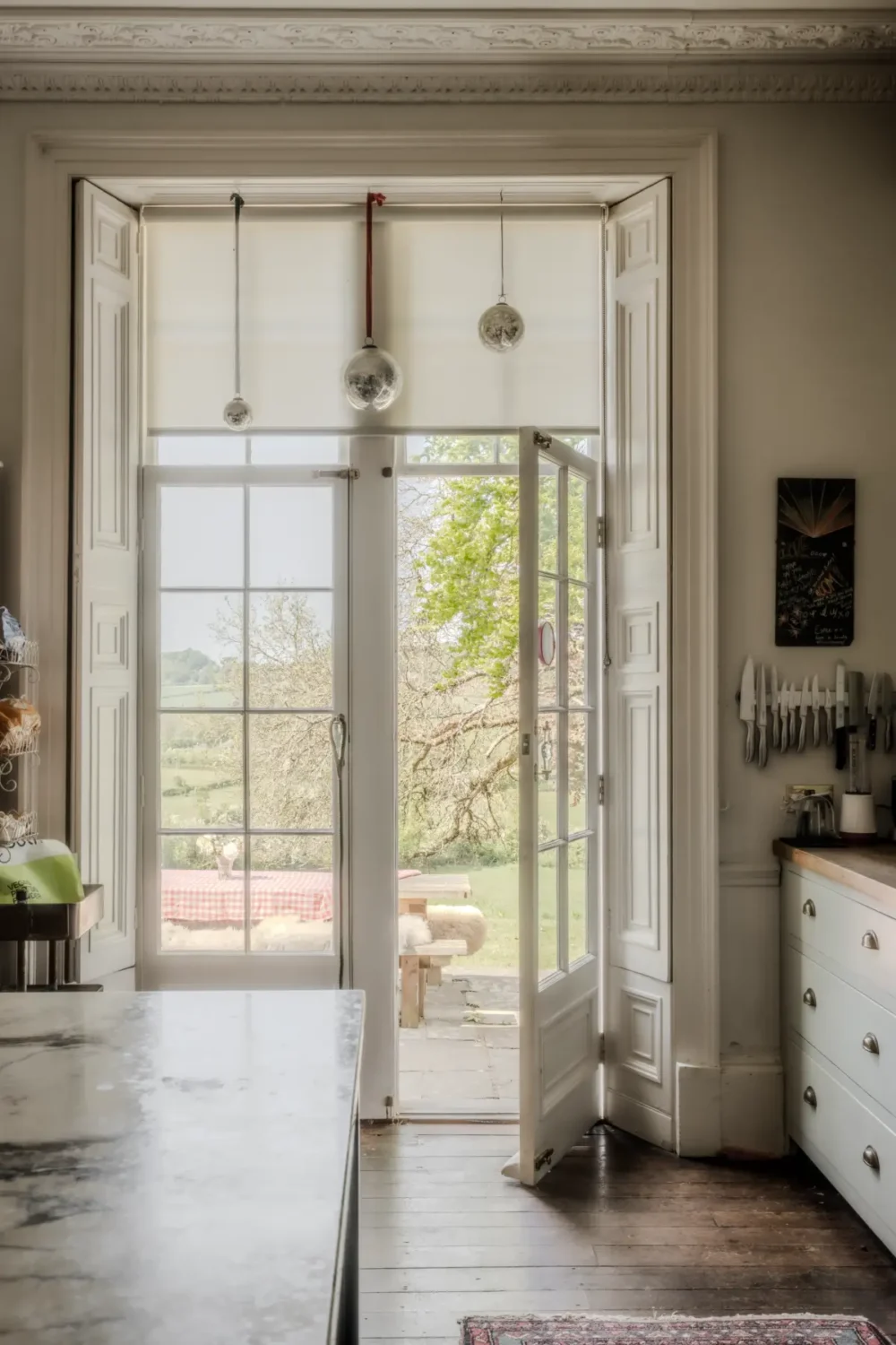 Pearl Lowe and Danny Goffey’s Eclectic Gothic Somerset Home Is For Sale 7 kitchen garden doors Pearl Lowe and Danny Goffey’s Eclectic Gothic Somerset Home Is For Sale