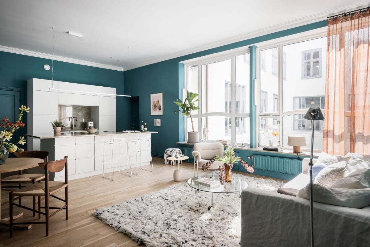 A Teal Green Living Room and Large Windows in a Swedish Apartment 3 light open plan living space teal green walls
