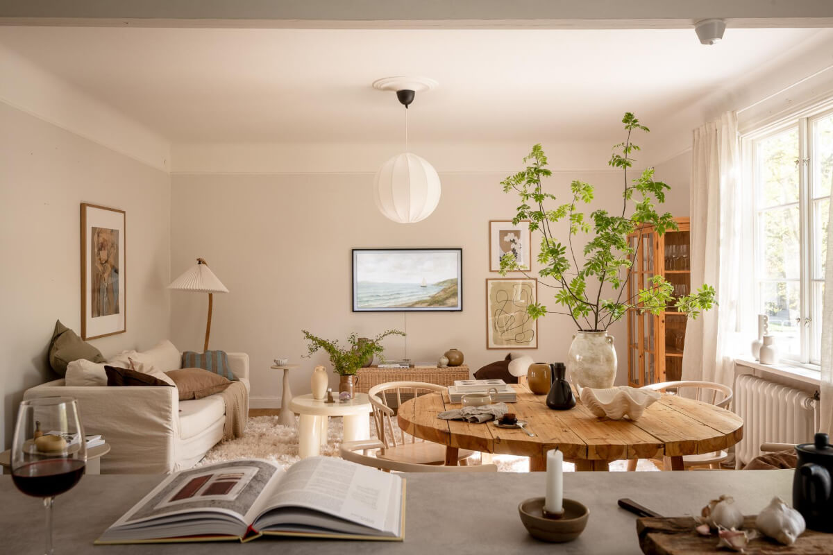 A Cozy Swedish Apartment with a Walk-In Pantry in the Sage Green Kitchen 7 light open plan living space