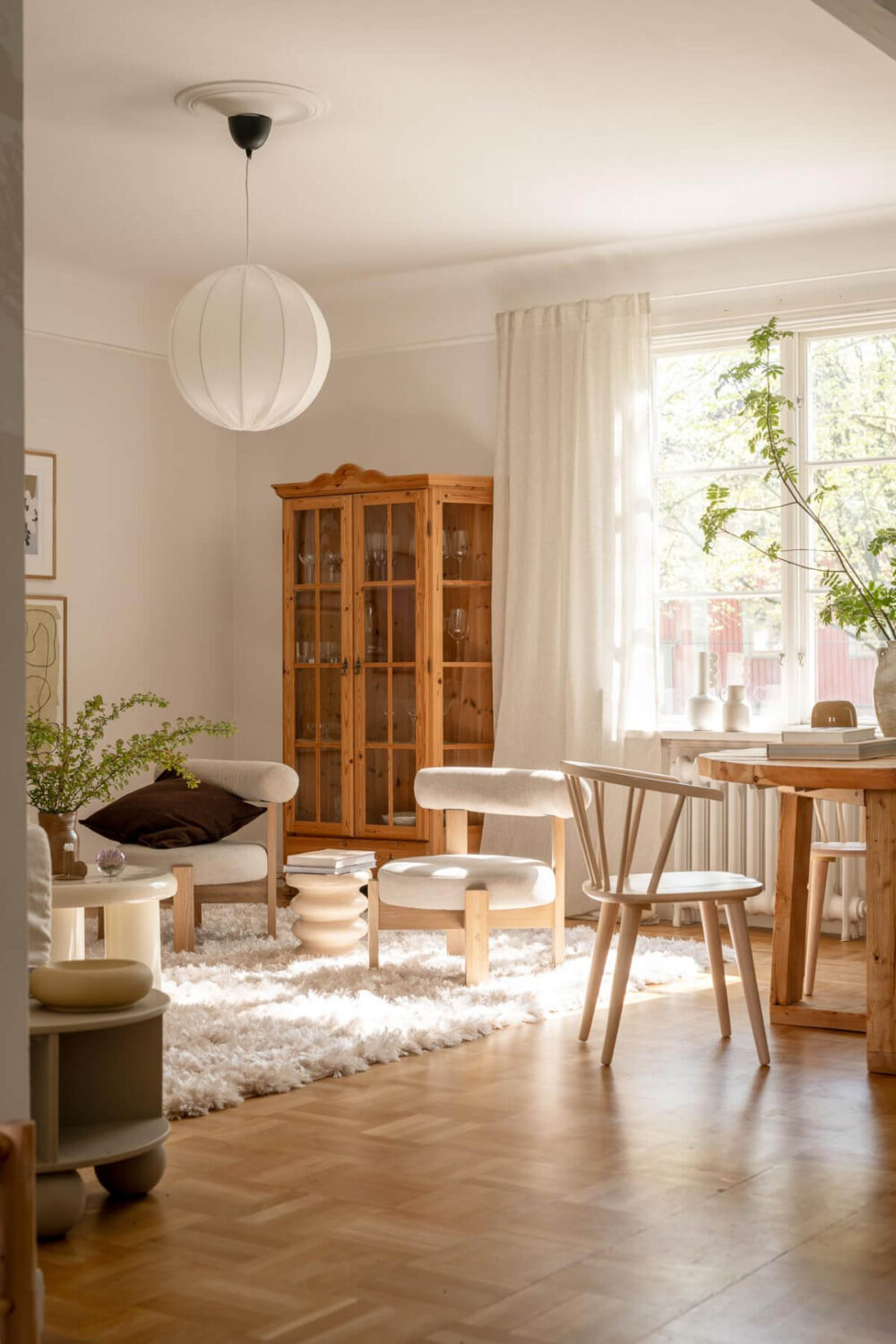 A Cozy Swedish Apartment with a Walk-In Pantry in the Sage Green Kitchen 3 living room