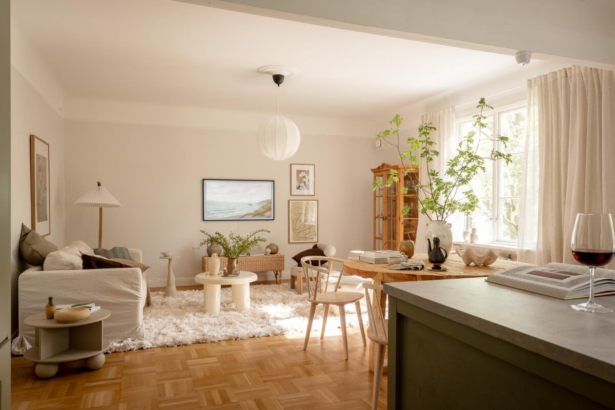 A Cozy Swedish Apartment with a Walk-In Pantry in the Sage Green Kitchen 6 open plan living room