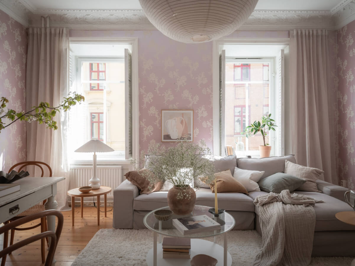 A Historic Apartment with Classic Wallpapers and Contemporary Furniture 2 scandi living room large windows with shutters pink wallpaper