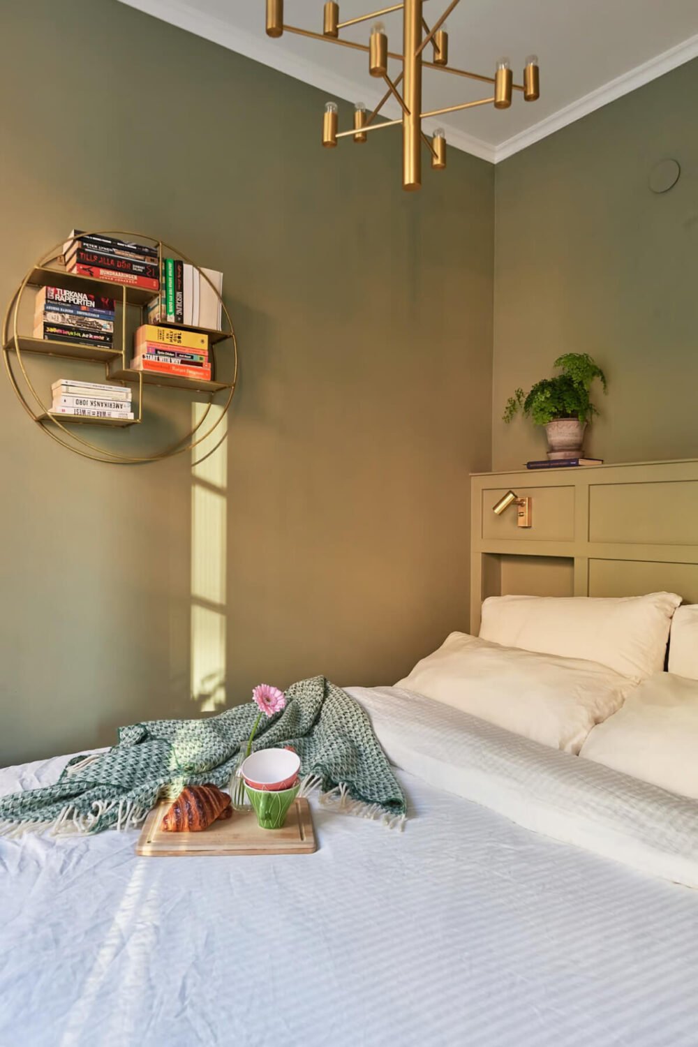 A Green Swedish Corner Apartment with an Open Floor Plan 14 small green bedroom