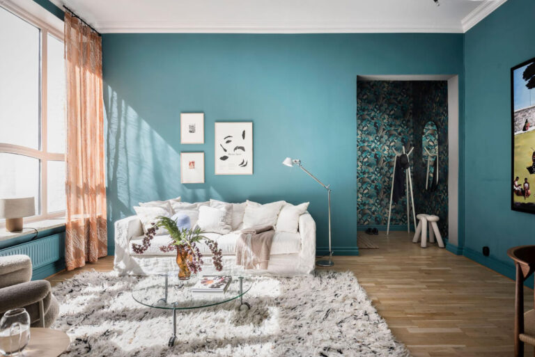 A Teal Green Living Room and Large Windows in a Swedish Apartment - The Nordroom