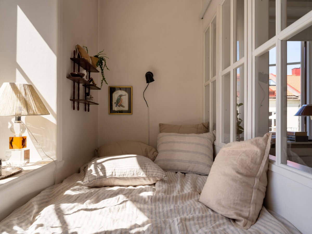 A Small Light-Filled Corner Apartment with Original Details 10 tiny bedroom wooden shelves