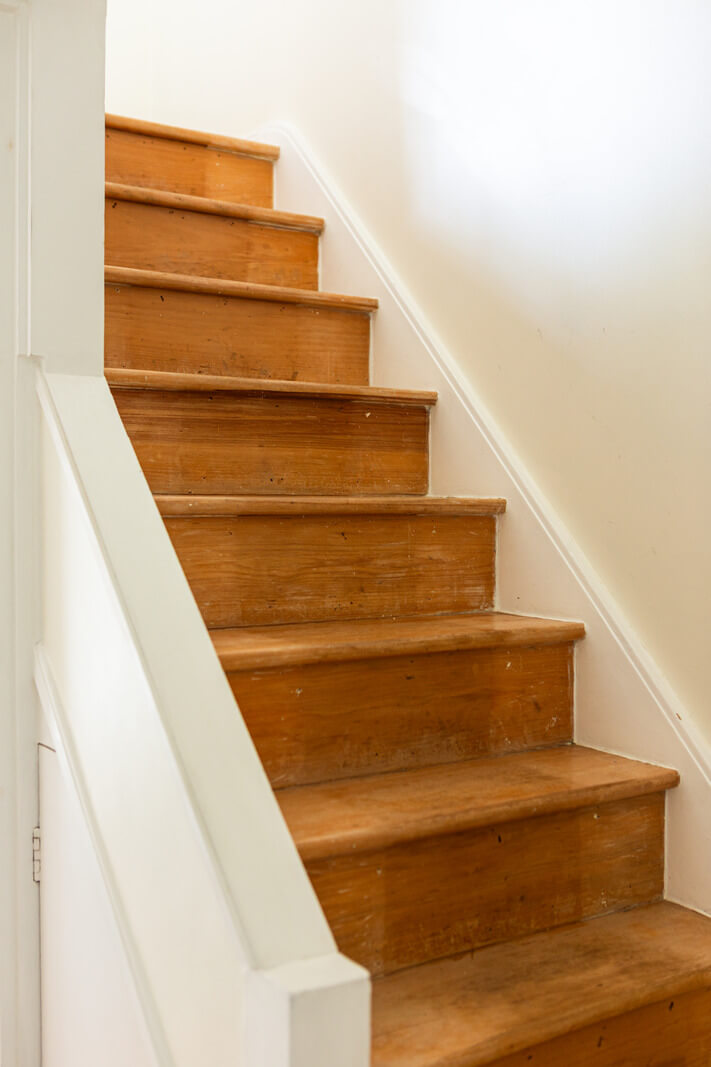 An Open-Plan Living Space and Colorful Bedrooms in a London Duplex 13 wooden stairs