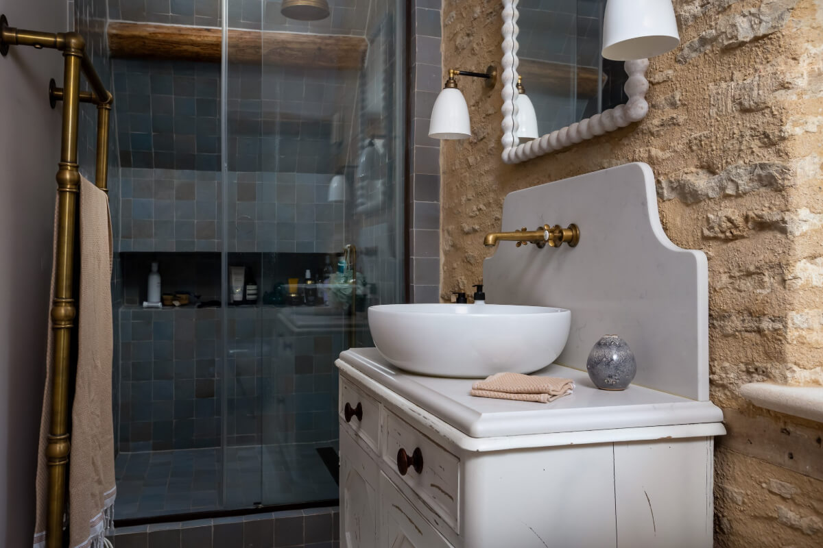 bathroom stone wall blue shower tiles