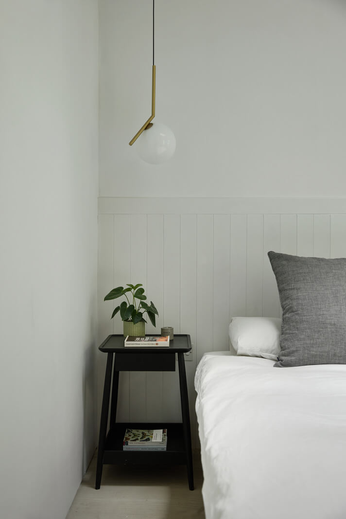 bedroom wooden paneled feature wall