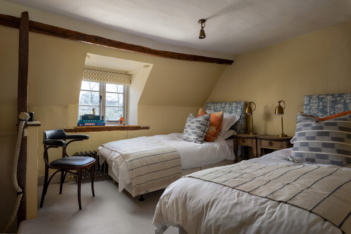 beige-yellow twin bedrooms