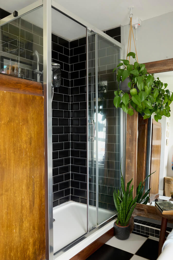 black subway tiles shower
