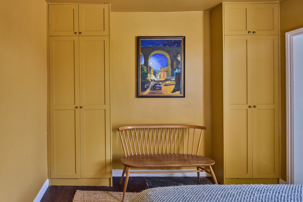 built-in wardrobes yellow bedroom