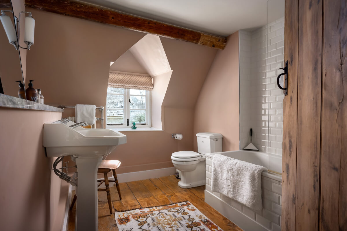 cottage bathroom light pink walls wooden floor
