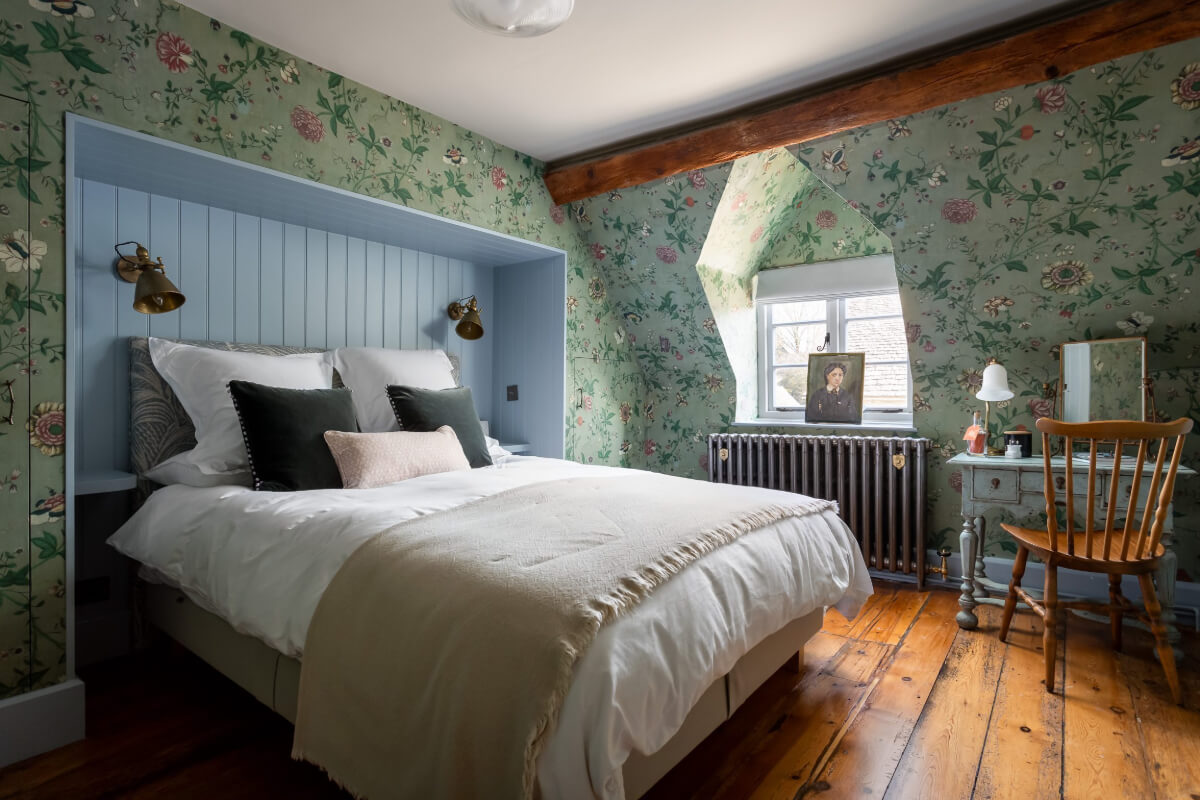cottage bedroom blue built-in bedframe green wallpaper