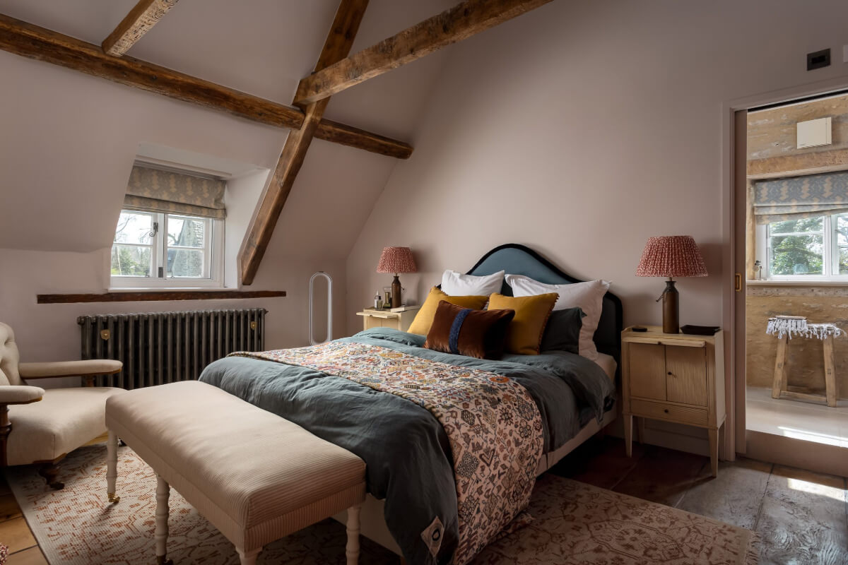 cottage bedroom exposed wooden beams