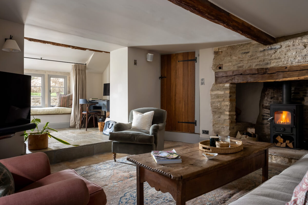 cottage living room brick hearth window seat