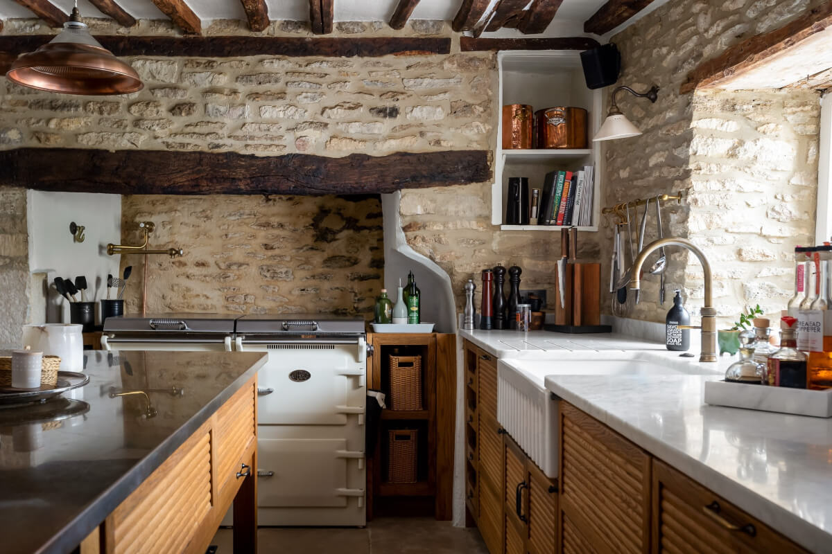 devol kitchen exposed stone and wooden ceiling beams