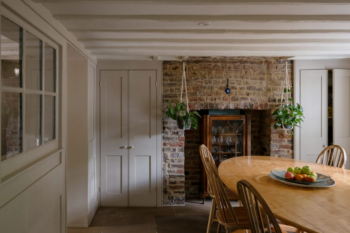 dining room exposed brick wall