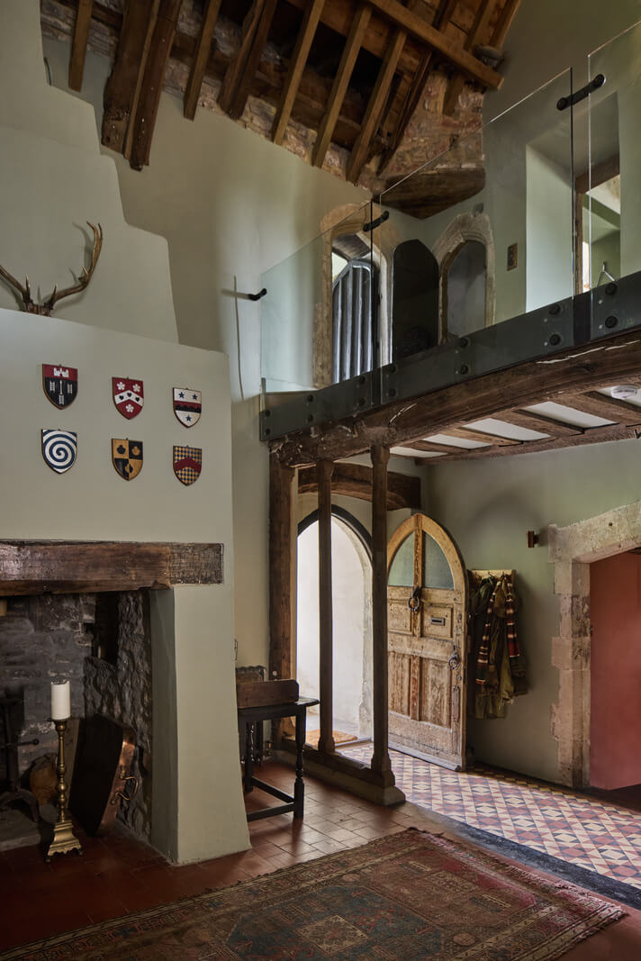 exposed beams fireplace tile floor medieval manro
