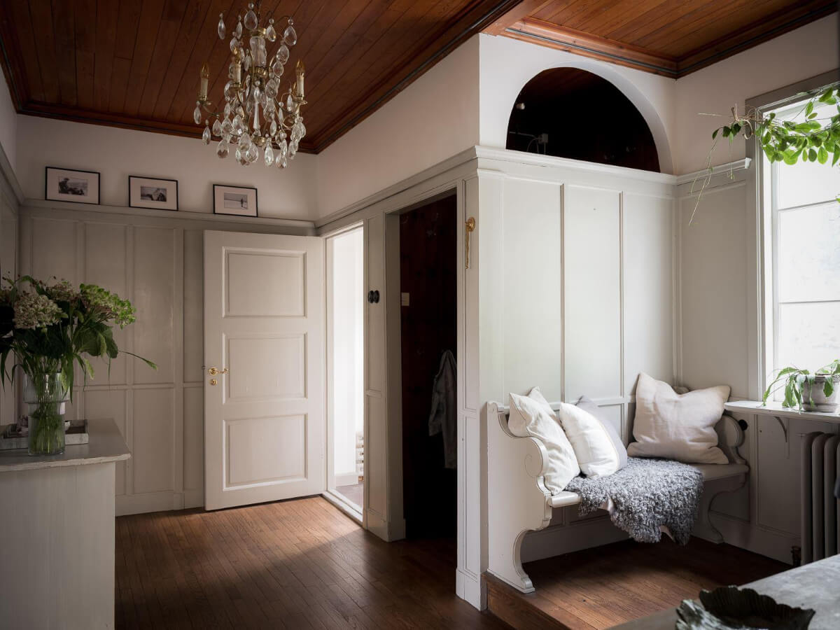 hall paneled walls dark wooden ceiling