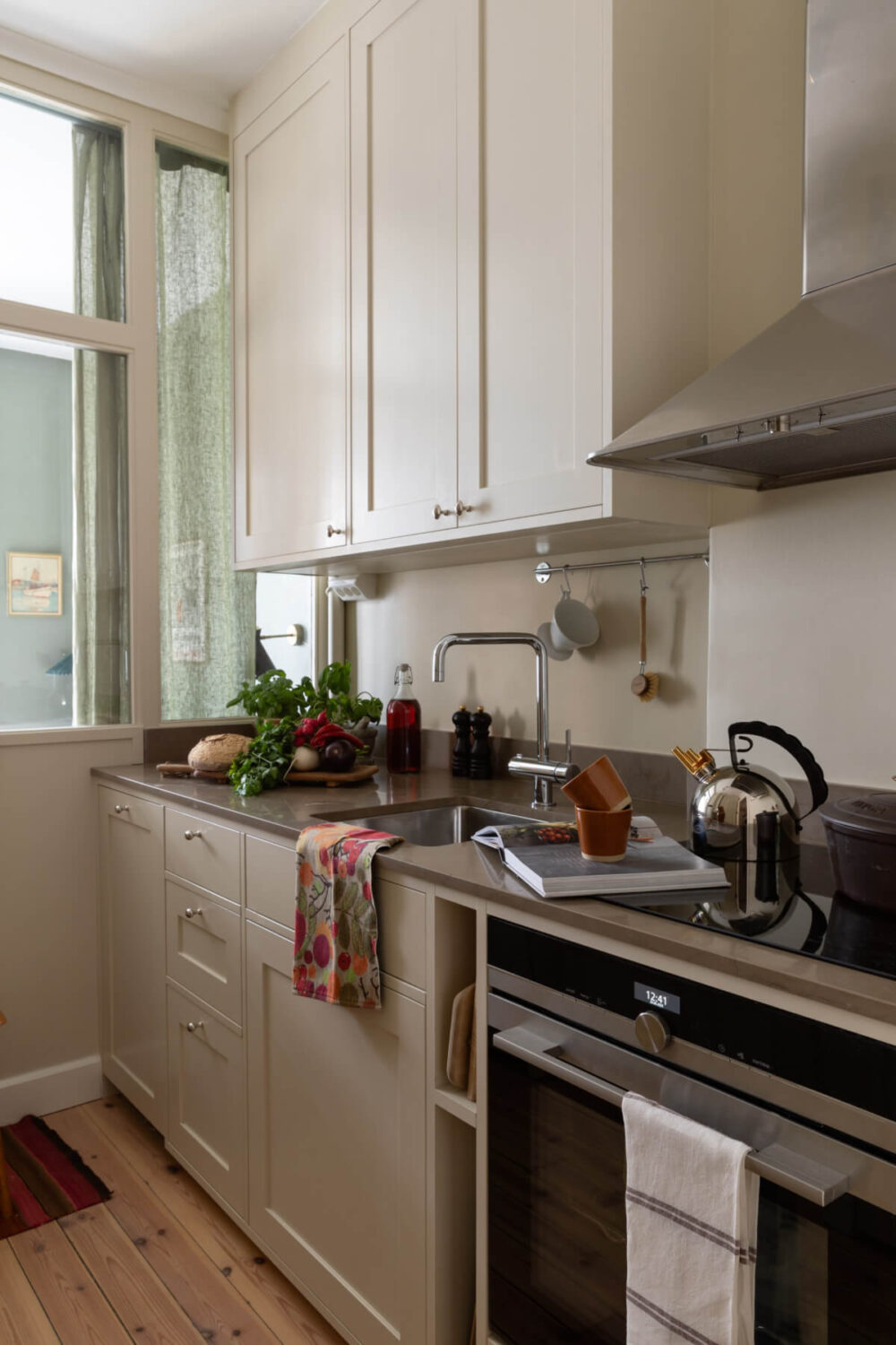 kitchen white cabinets glass wall