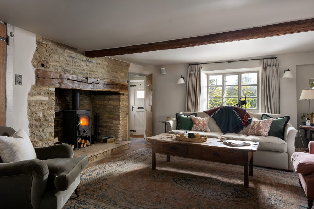 large brick fireplace cottage sitting room
