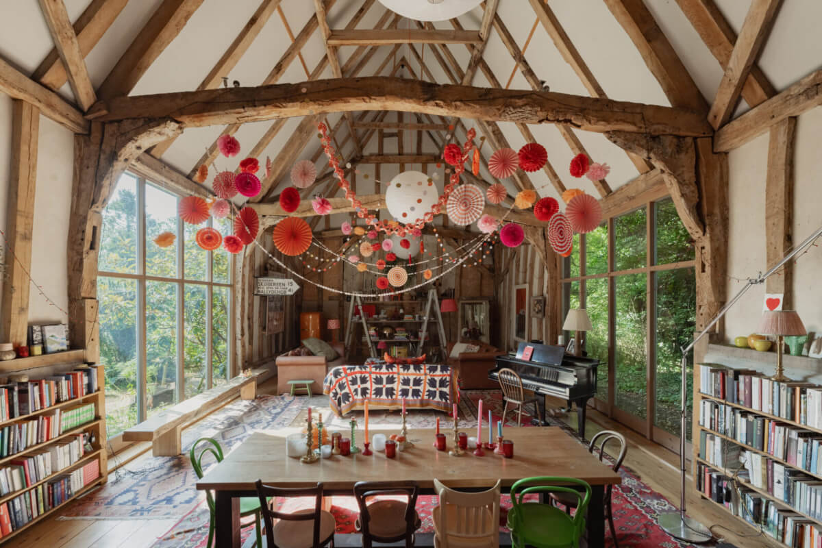 living space former barn exposed beams large windows