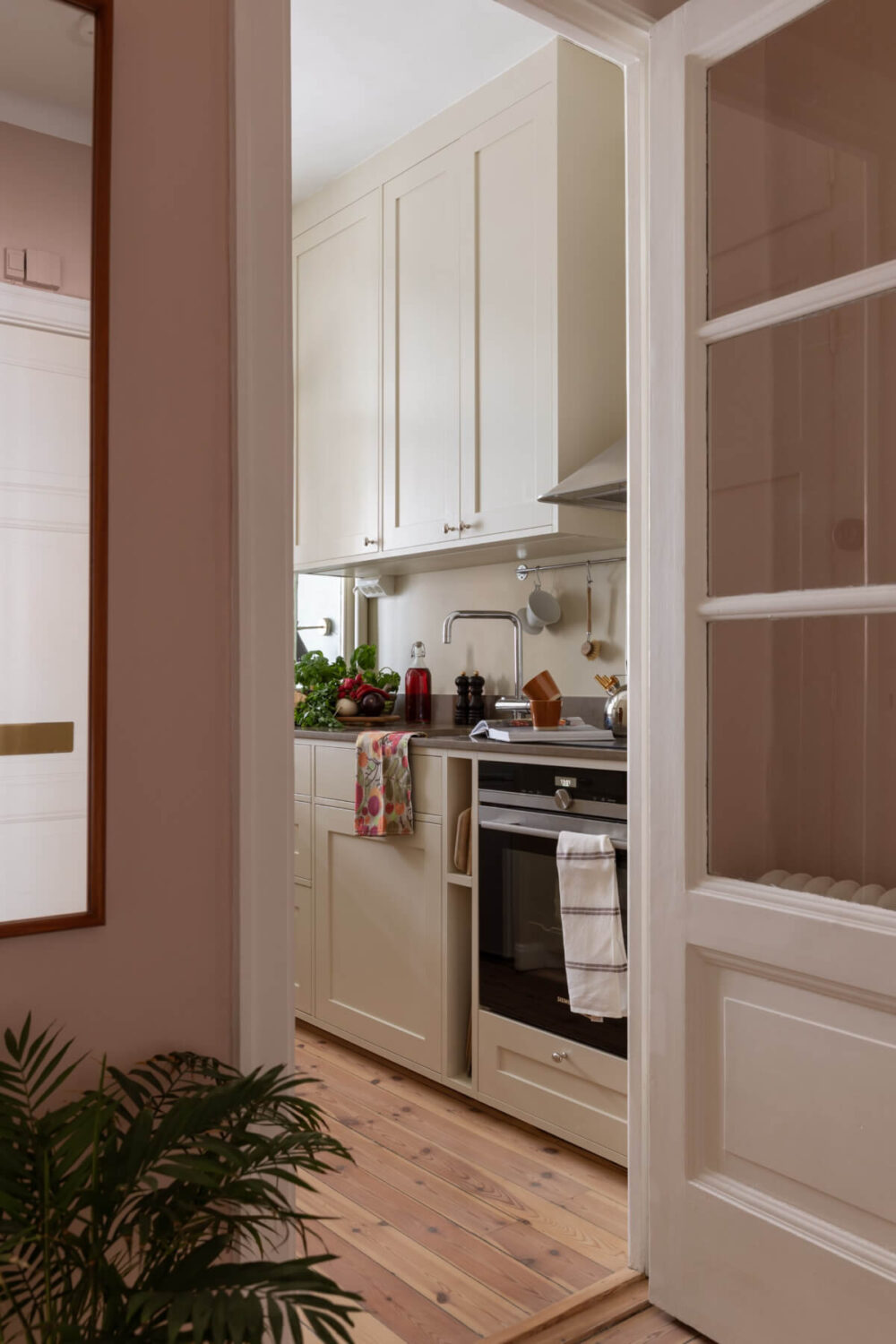 view into kitchen glass timber door
