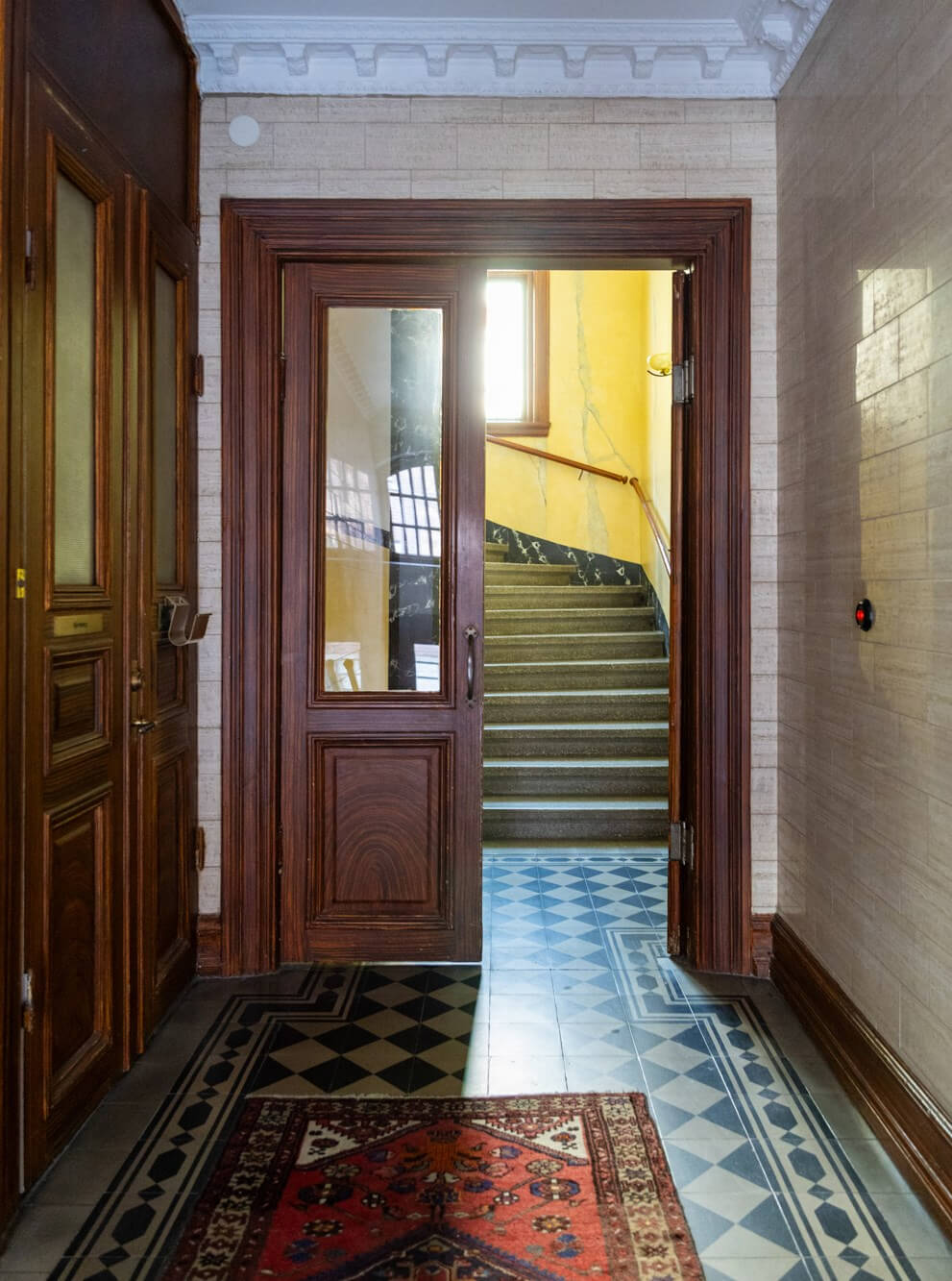 apartment building entry hall Classic Proportions and a Charming Kitchen in a Malmö Apartment