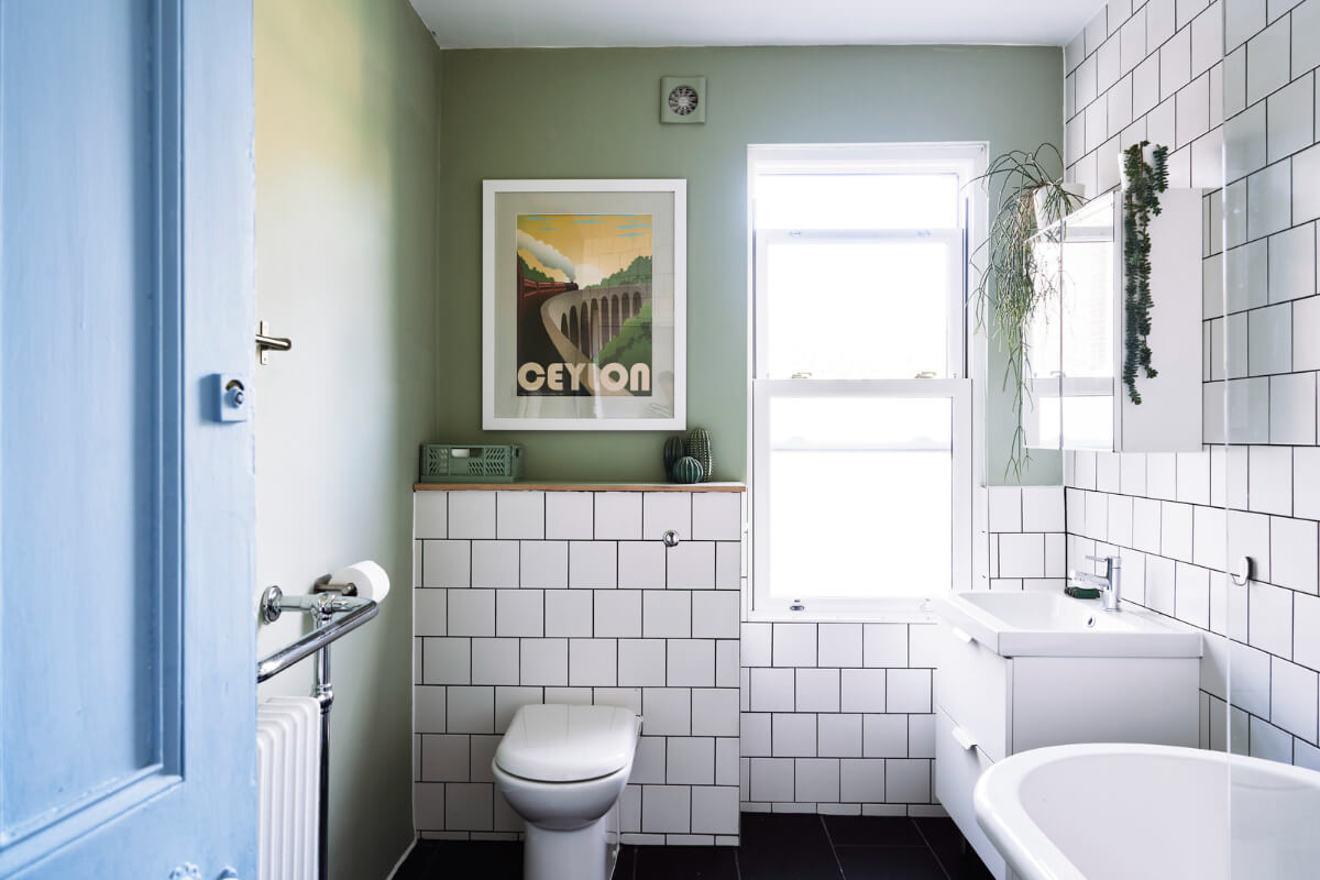 Colorful Rooms and a Modern Kitchen in a Spacious Family Home 19 bathroom green walls white tiles