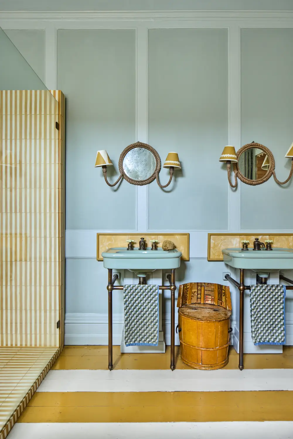 A Colorful Design-Led Georgian House in the Heart of Henley-on-Thames 39 bathroom-yellow-white-striped-tiles-floor-blue-sinks-nordroom