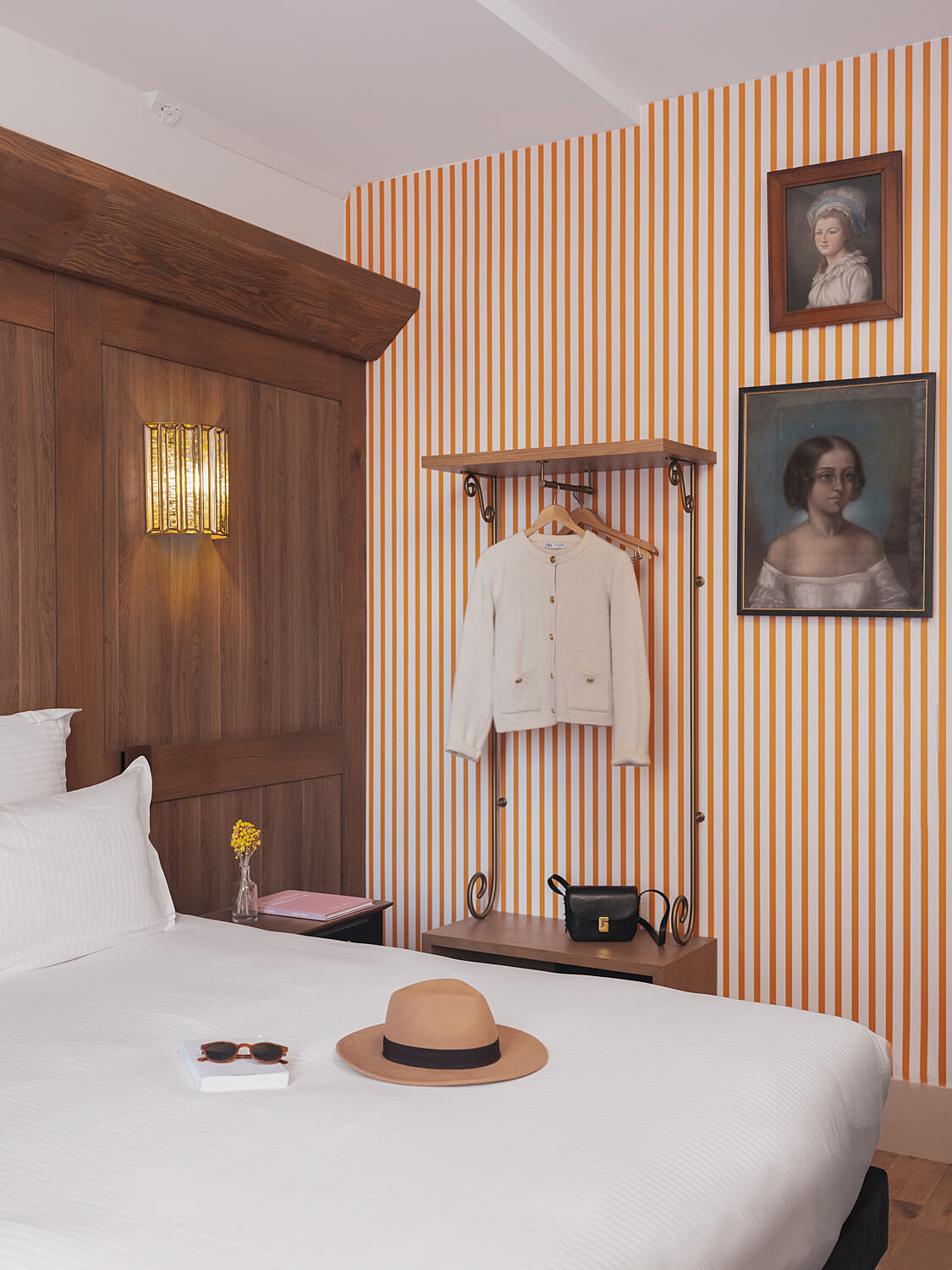 bedroom wood paneling striped wallpaper hotel madeleine de senlis paris latin quarter nordroom Top Boutique & Design Hotels in the Latin Quarter of Paris