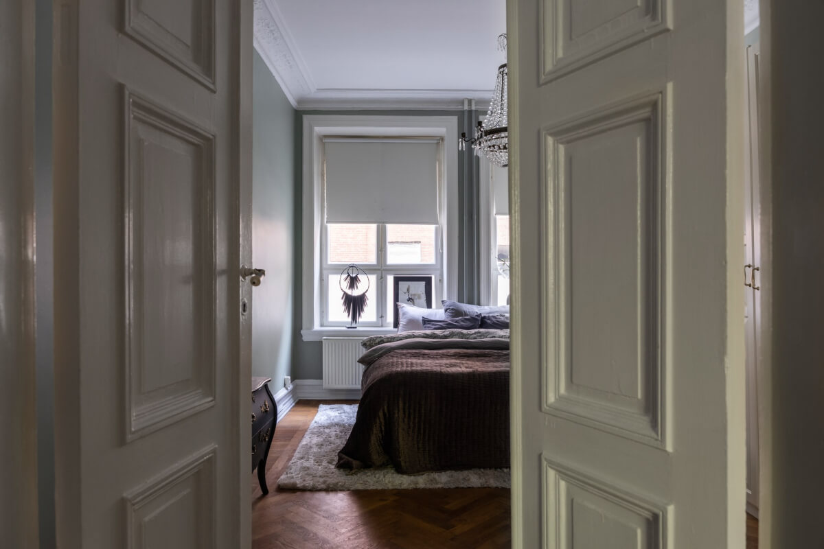 double wooden doors to bedroom