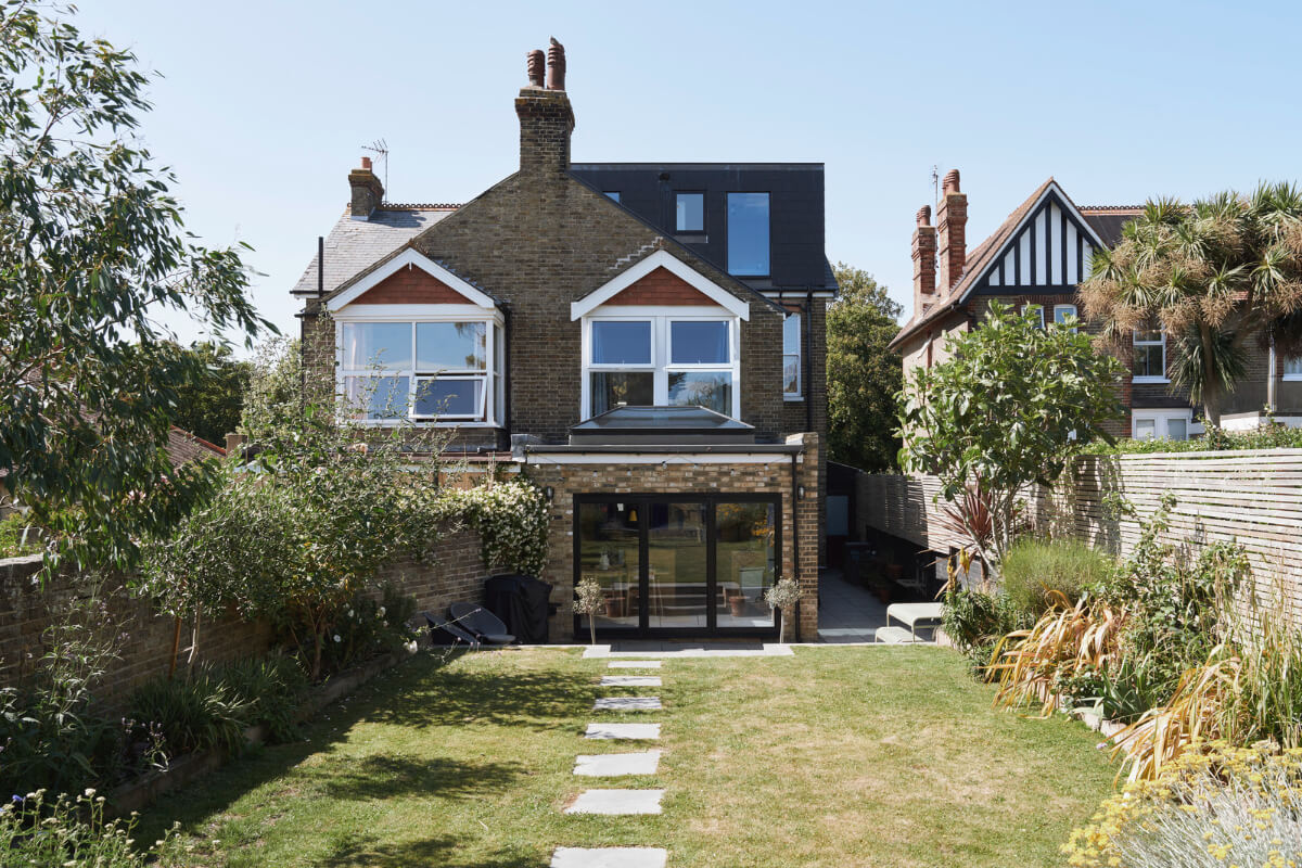 Colorful Rooms and a Modern Kitchen in a Spacious Family Home 27 garden exterior london house Colorful Rooms and a Modern Kitchen in a Spacious Family Home