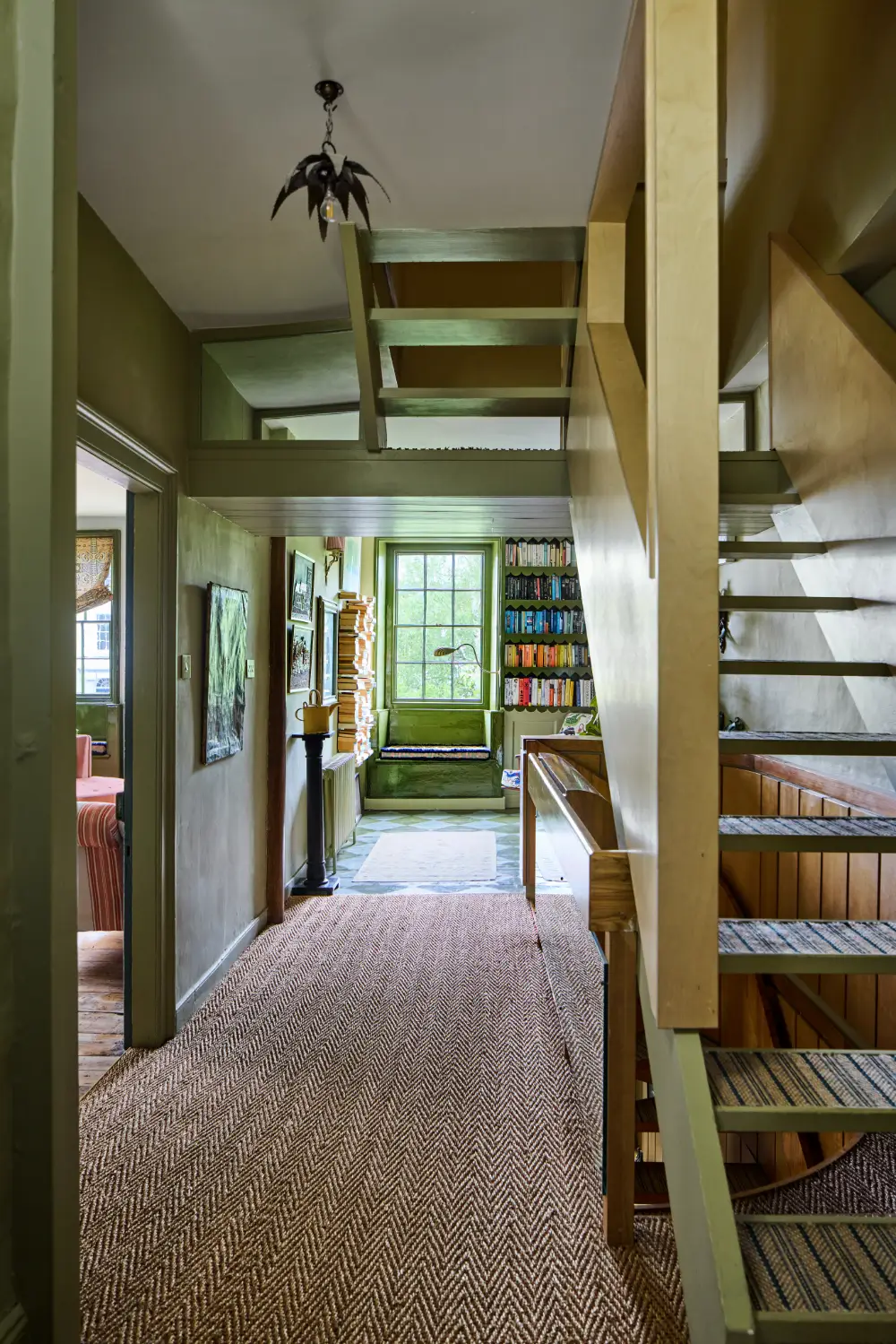 A Colorful Design-Led Georgian House in the Heart of Henley-on-Thames 45 green-landing-window-seat