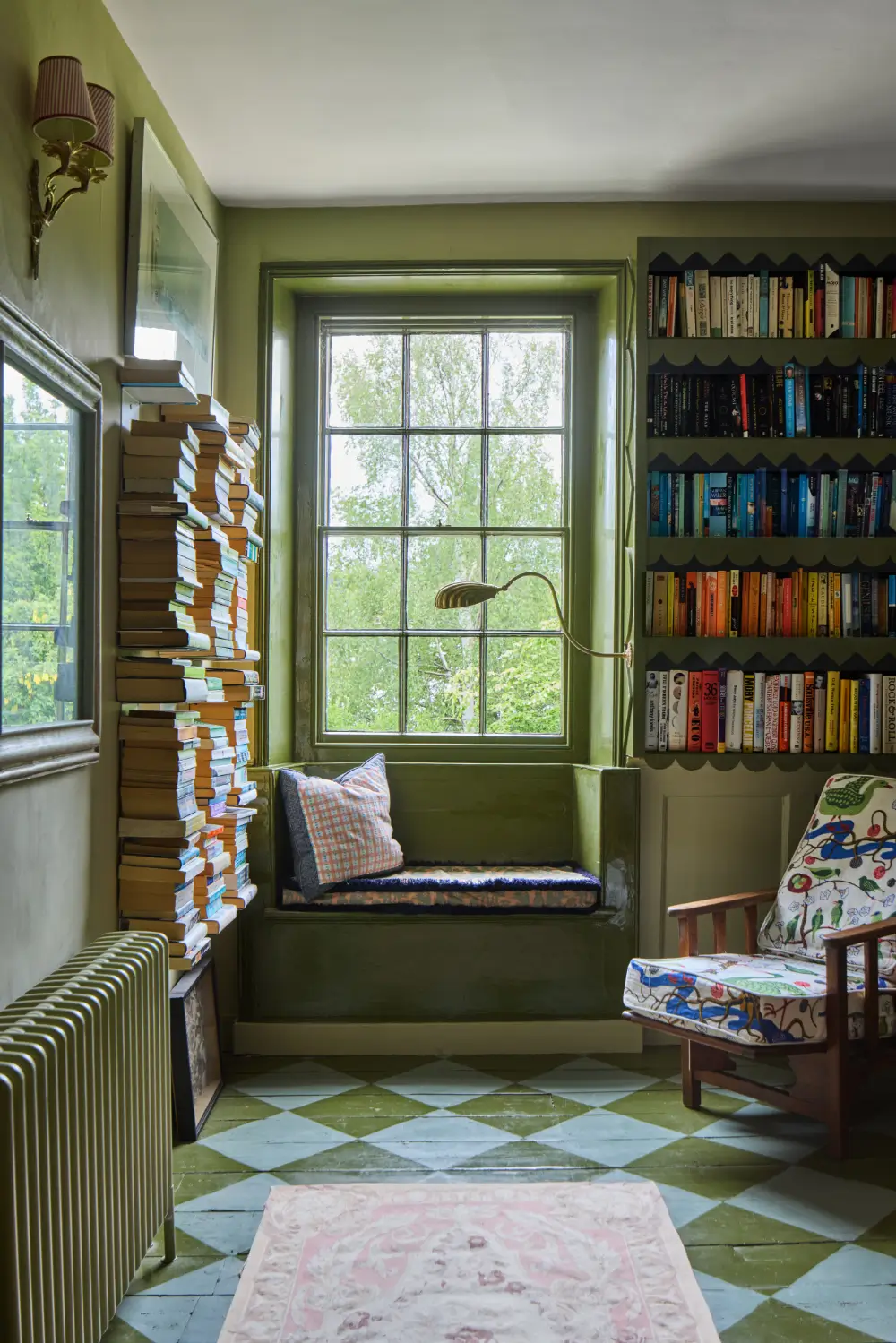 A Colorful Design-Led Georgian House in the Heart of Henley-on-Thames 47 green-window-seat-checkerboard-floor-built-in-bookcases-nordroom