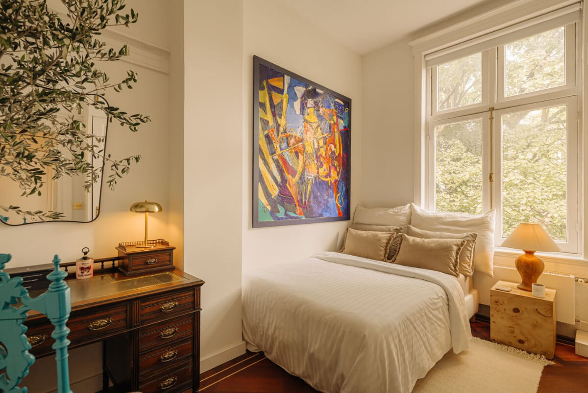 guest bedroom with antique desk