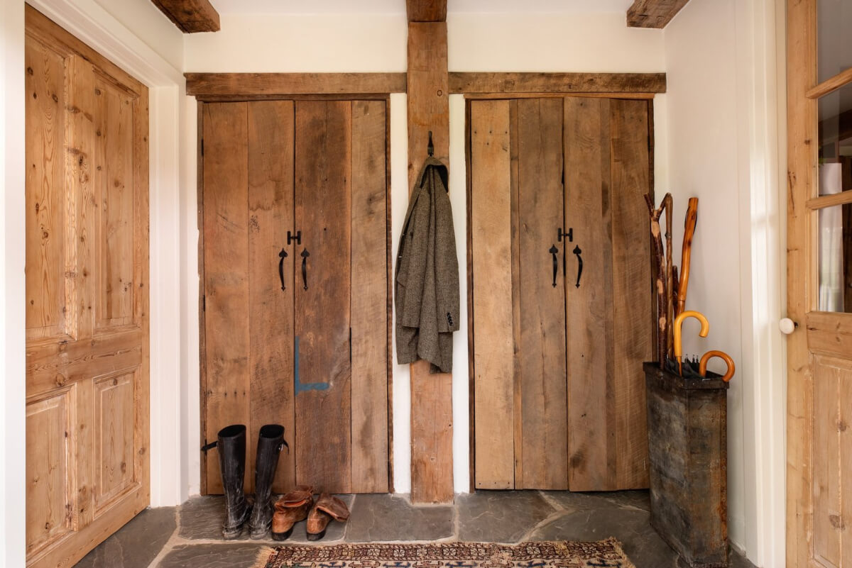 hall rustic timber doors built-in wardrobes