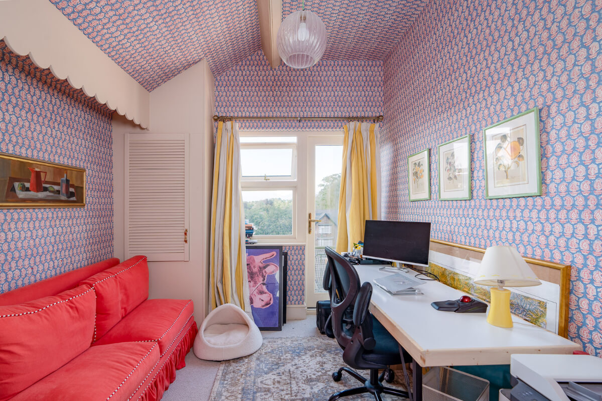 home office with blue wallpaper