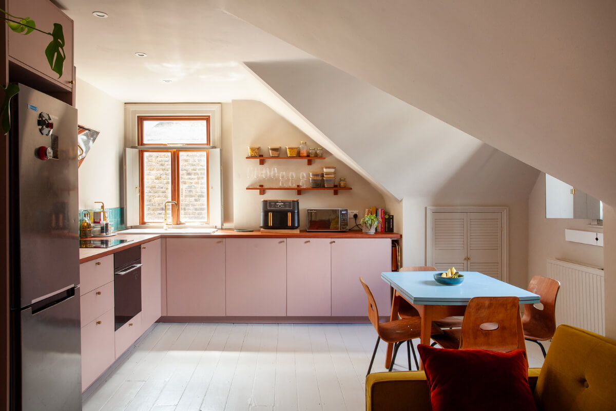 kitchen pink cabinets blue dining table