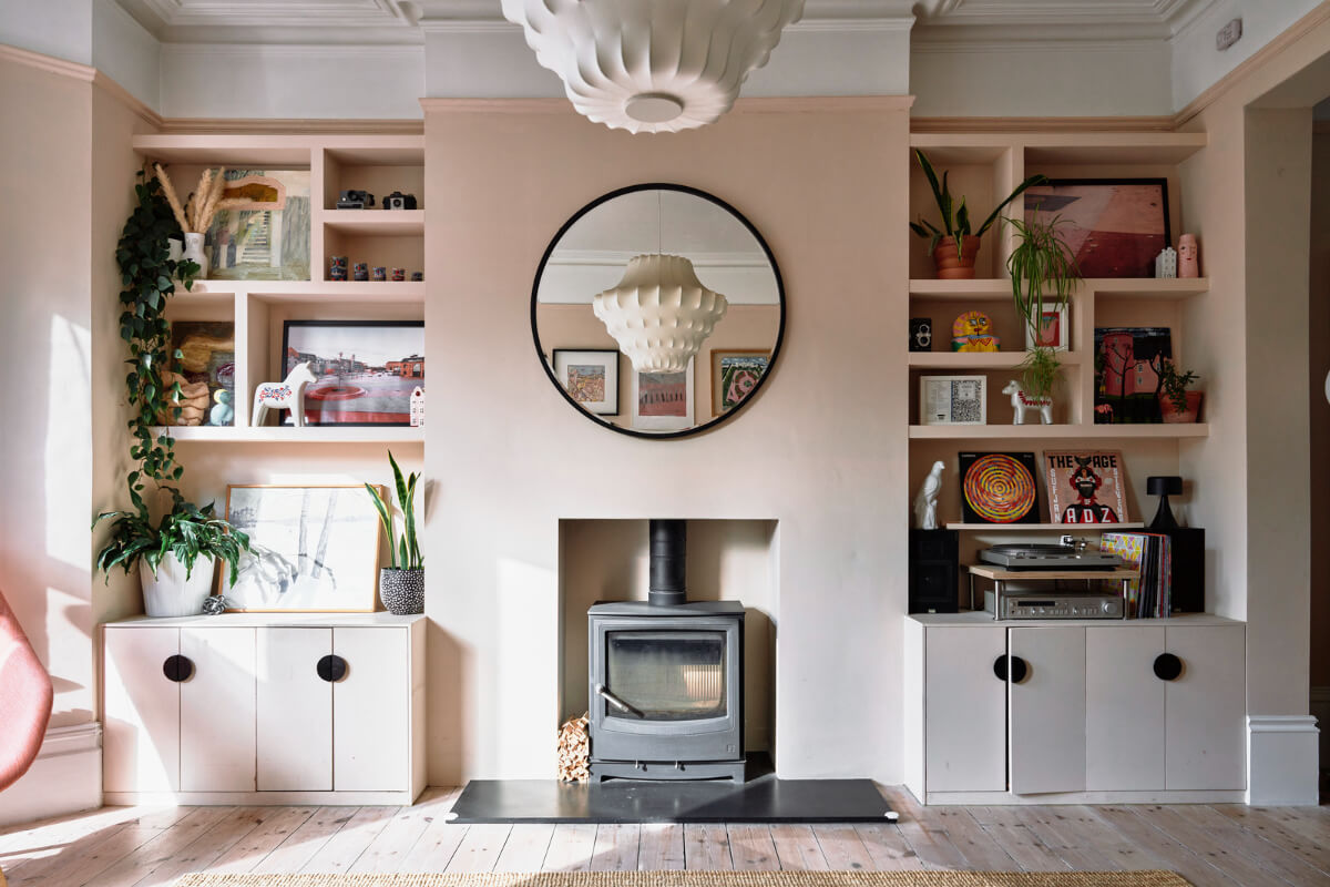 Colorful Rooms and a Modern Kitchen in a Spacious Family Home 3 pink sitting room built-in shelves