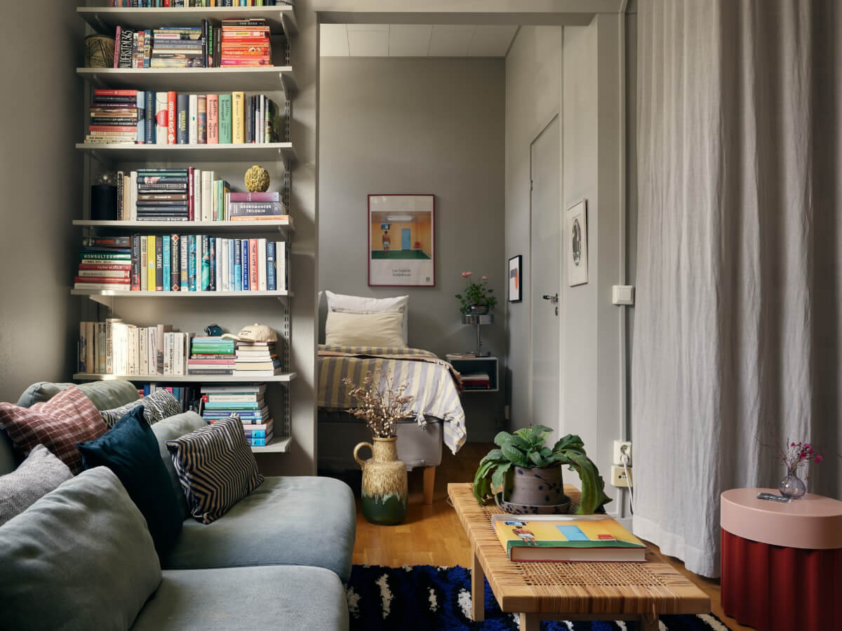 semi-open gray apartment with bookshelves