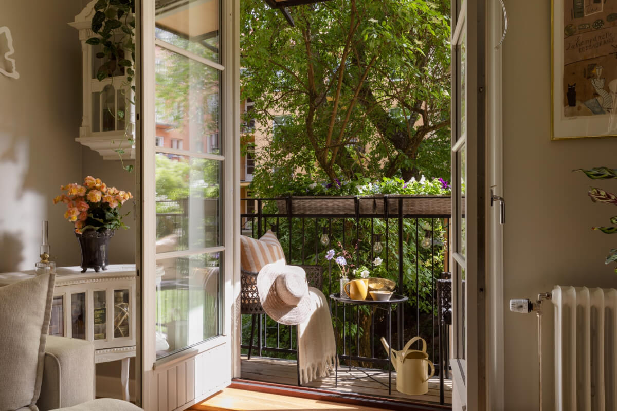 A 1930s Stockholm Apartment With Views of a Lush Garden 4 balcony with views of trees