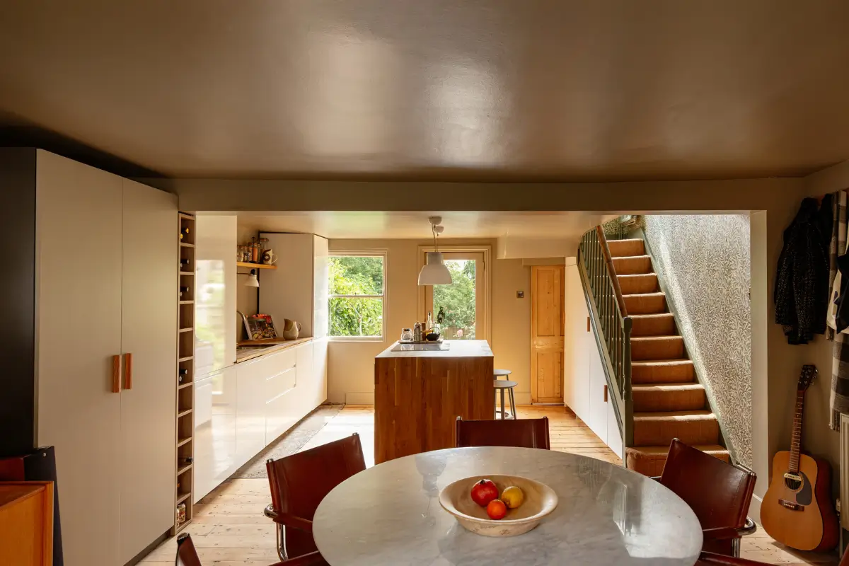 A Muted Color Palette and Original Details in a Victorian Terrace House 7 basement kitchen dining room