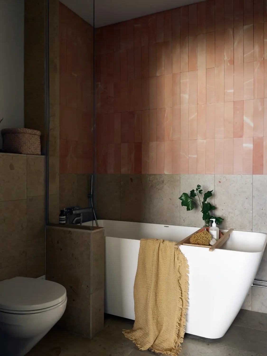 Industrial Elements in a 1960s Duplex Apartment in Stockholm 41 bathroom gray and pink tiles nordroom