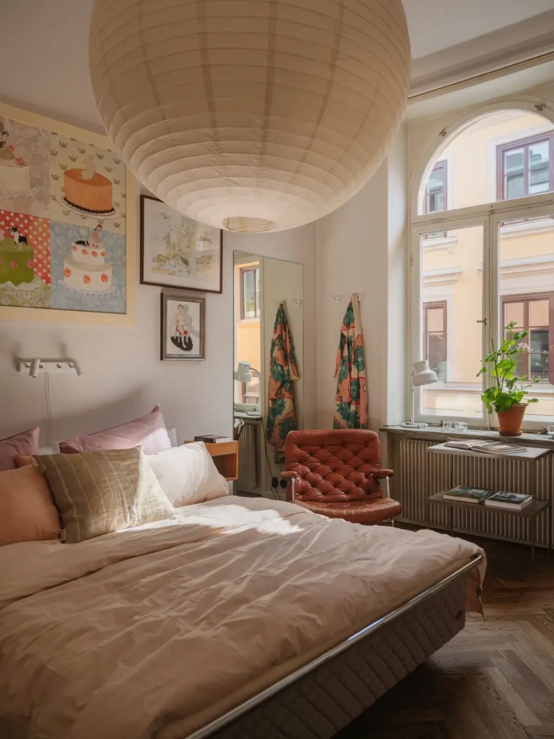 A Classic Late 19th Century Apartment with Magnificent Views of Stockholm 26 bedroom arch window herringbone floor